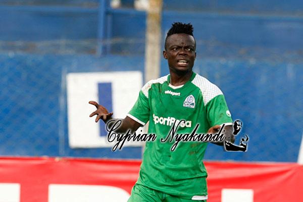 Dennis Oliech Pushes Ivorian Striker Ephrem Guikan Out Of Gor Mahia