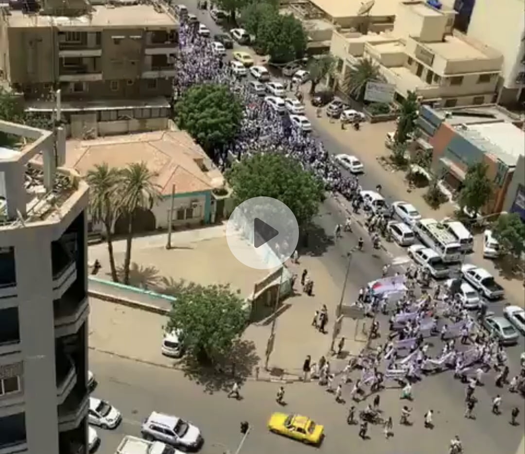 Video: Revolution Is Far From Achieved As Doctors In Sudan March In Colourful 'White Coat' Protests