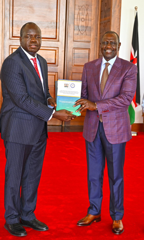 An image of President William Ruto receiving the final report from the IEBC Selection Panel at State House, Nairobi.